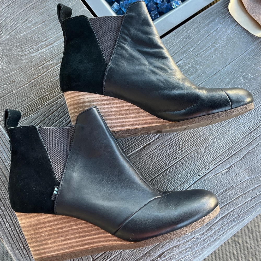 Toms Black pull on Ankle Booties with wedge wood grain heel.